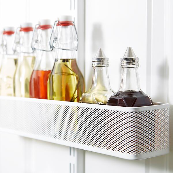 Clear, glass bottles with stoppers for vinegars and liquids in the pantry  :: OrganizingM…
