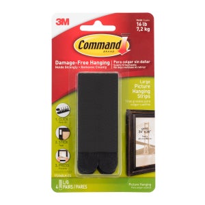 Command strips on brick Command strips on brick