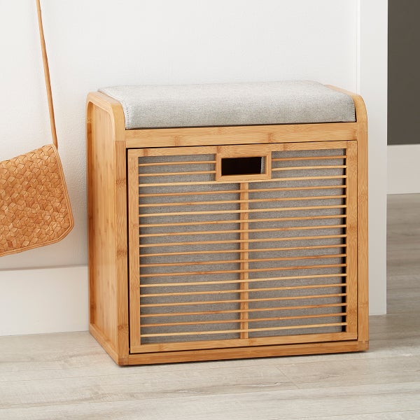 A brown bamboo storage bench