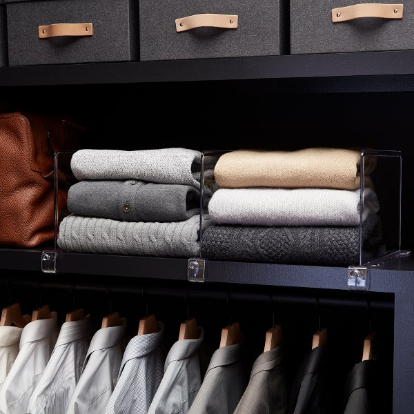 Shelf dividers allow for more organized stacking clothes