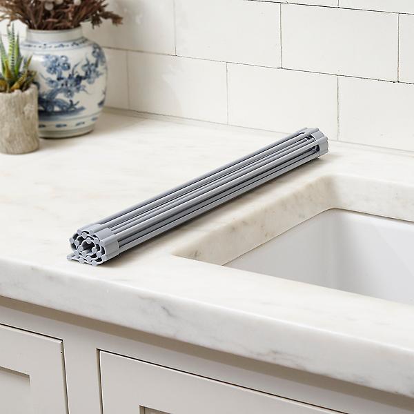 https://www.containerstore.com/catalogimages/390388/10065378-Over-The-Sink-Roll-Up-Dryin.jpg?width=600&height=600&align=center
