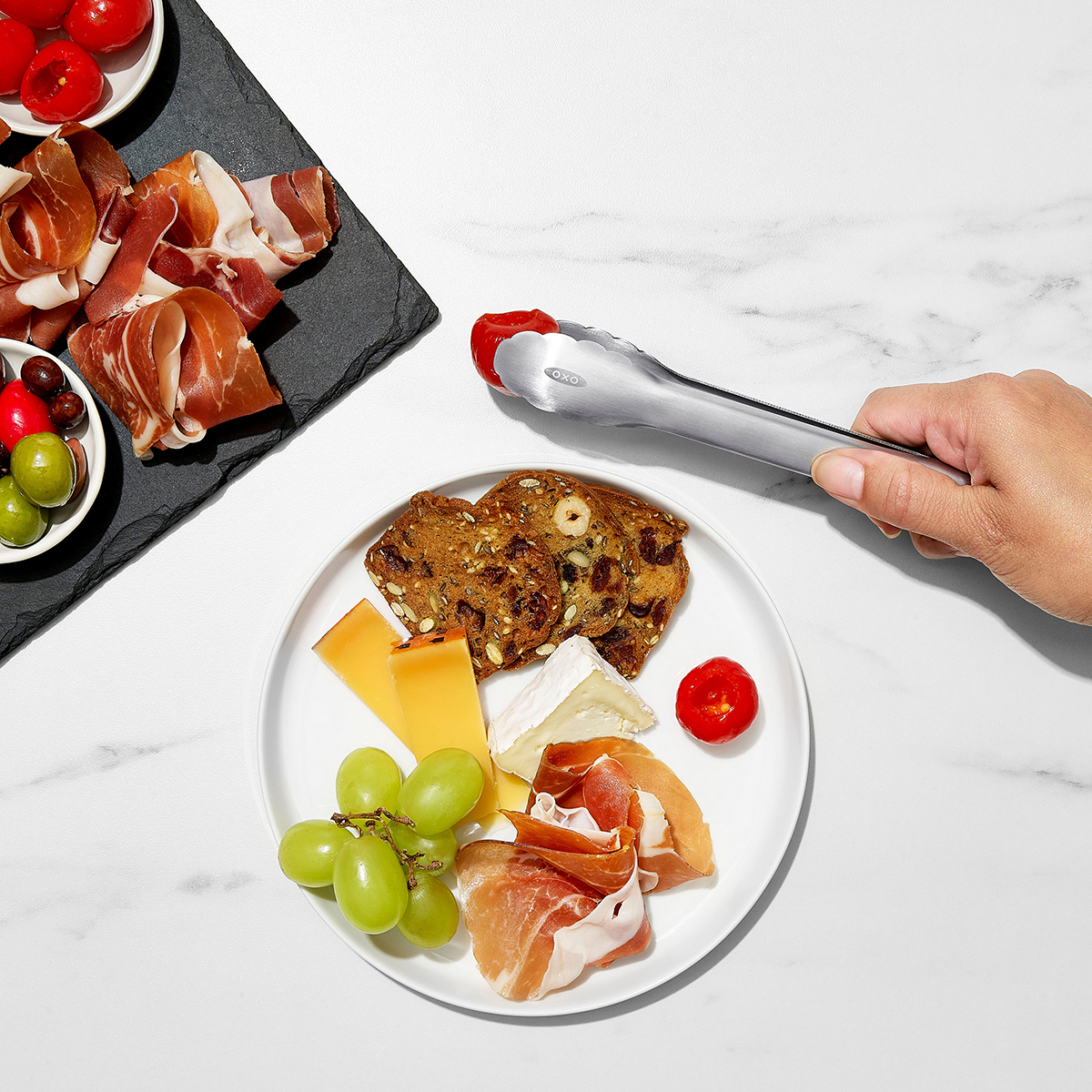 https://www.containerstore.com/catalogimages/394619/10082368-OXO-Mini-Tongs-VEN7.jpg