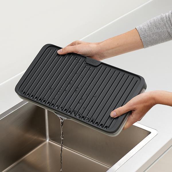 https://www.containerstore.com/catalogimages/415931/10082753-JJ_Tier_ExpandableDrainingB.jpg?width=600&height=600&align=center