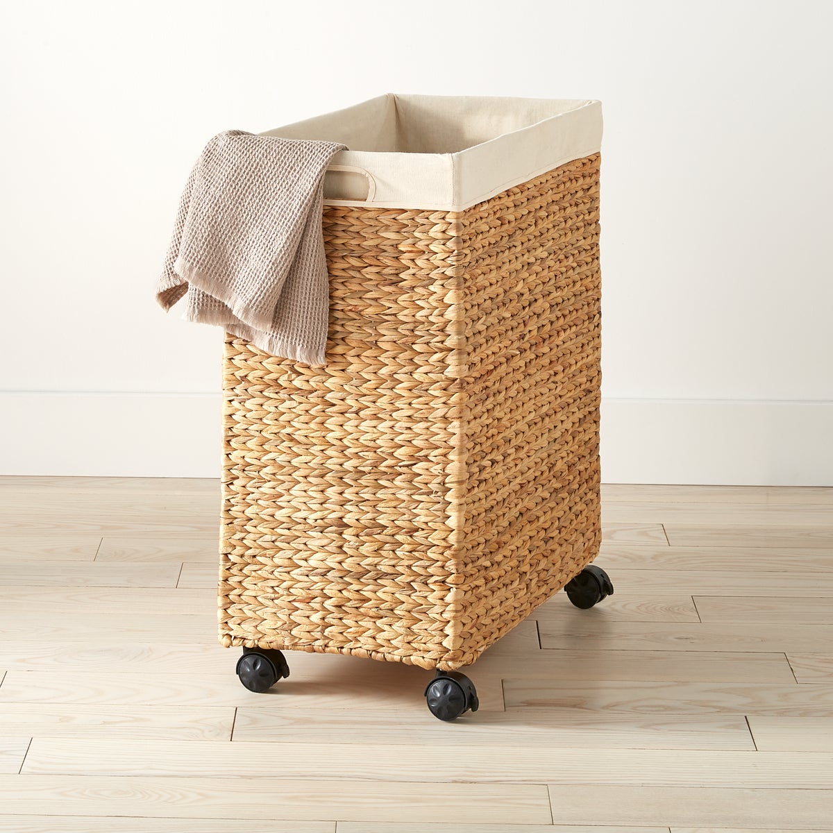 Water Hyacinth Rolling Laundry Cart The Container Store