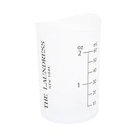 The Laundress 2 oz. Detergent Measuring Cup Clear