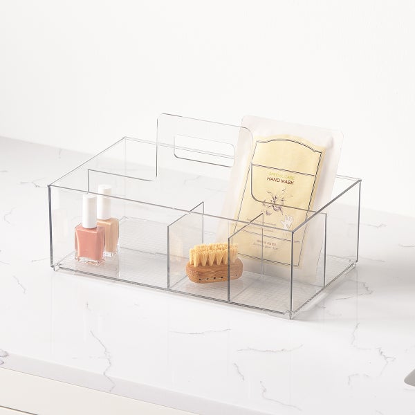 A clear organizer with items inside